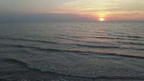 Aerial Fly Back: Beautiful Sea Sunset at Baltic Sea