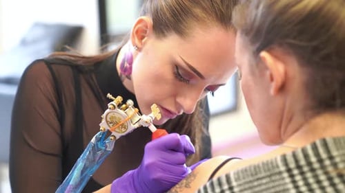 Tattoo Artist Creates Detailed Body Art on Arm