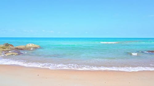 Beautiful tropical beach sea ocean with blue sky and white cloud