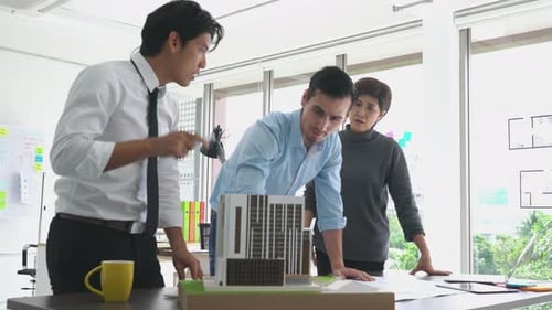 Business man and woman brainstorming