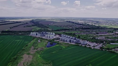 Aerial View New Grain Elevator and a Field in the Foreground