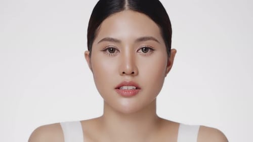 Close Up of Young Woman's Face on White