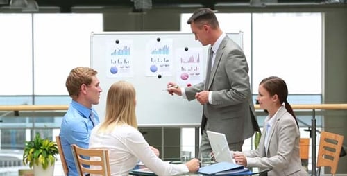 Office Team Working Together in a Business Meeting