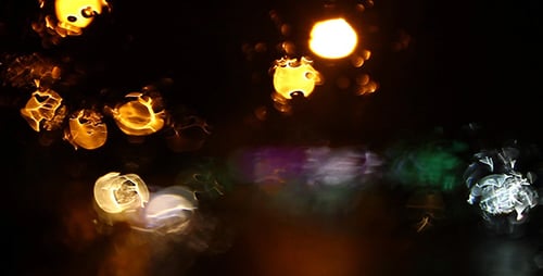 Bokeh 4 de tráfico nocturno lluvioso - Full HD