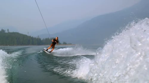 Man wakeboarding in the river 4k