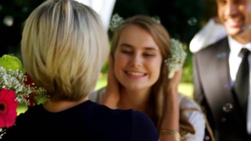 Bride Embracing Mother on Wedding Day