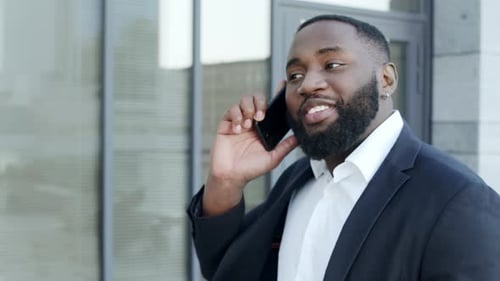 Businessman Talking on Smartphone at Street. Business Man Calling on Phone