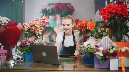 Florist Using Technology in Flower Shop