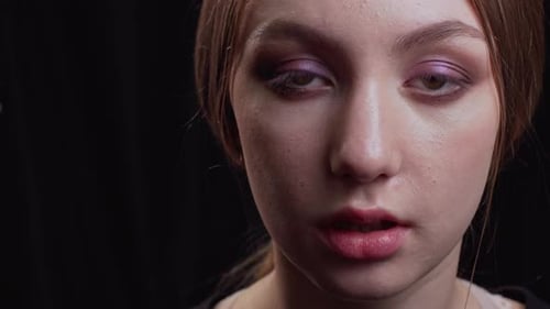 Close Up of Woman Getting Eye Makeup Applied