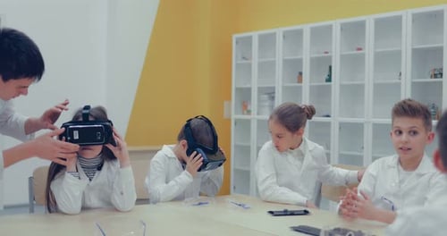 Children Learning Science Using VR Headsets in Class