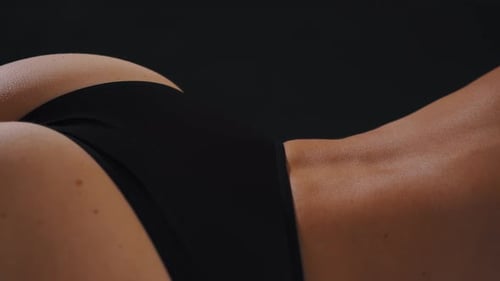 Beautiful Back of an Attractive Woman in Black Panties