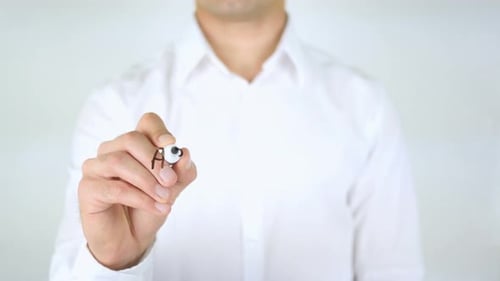 Man Writing Assistant on Clear Surface