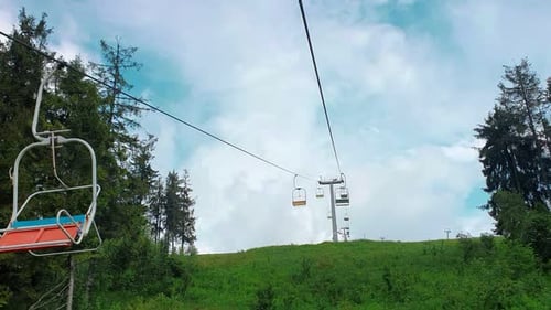 View From the Chair of the Cable Car on the Panorama of the Mountains on a Summer Sunny Day