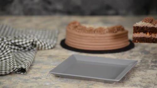 Serving a Delicious Slice of Chocolate Cake