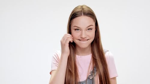 Young Beautiful Girl Smiling Over White Background