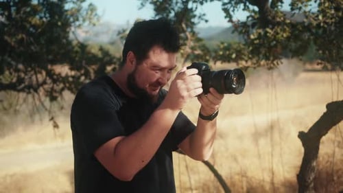 Photographer Taking Photos in Rural Landscape