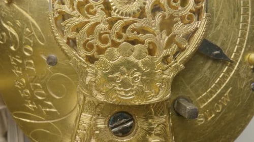 Ornate Gilded Timepiece Inner Mechanism Close Up