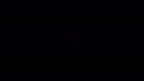 Dramatic Full Moon Shines in the Night Sky