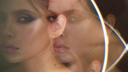 Woman with Glittery Makeup, Colorful Lens Flares