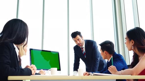 Business People in the Conference Room with Green Screen