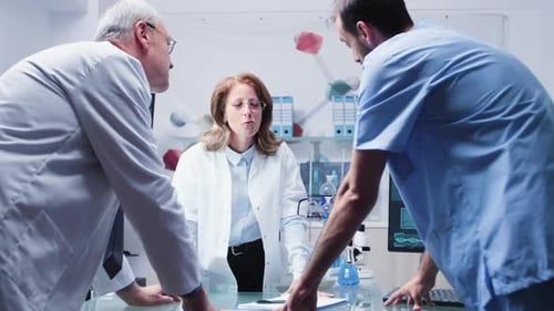 Medical Professionals Collaborating in a Bright Laboratory