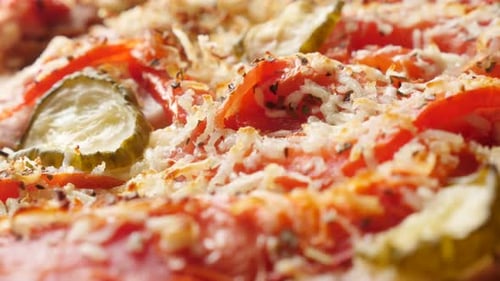Close-up of Delicious Pizza with Tomatoes and Pickles