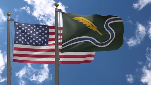 Waving Flags: United States and Quill River Design Against Blue Sky