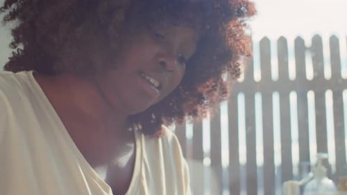 Child Getting Hair Washed in Bright Bathroom