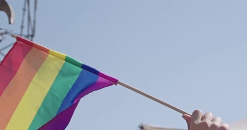 Rainbow Flag Waving in the Air at Pride