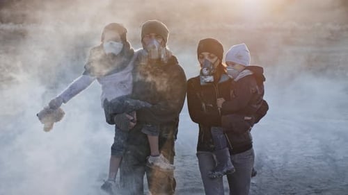 Survivor Family in Gas Mask Going Through Clouds of Toxic Smoke and Cinder