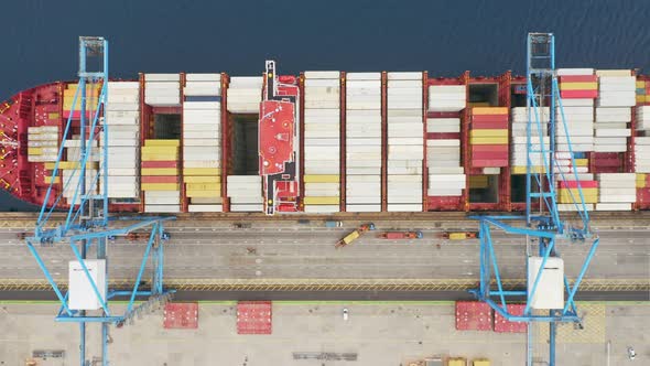Container Ship Loading Unloading In Port, Overhead Stock Footage ft ...