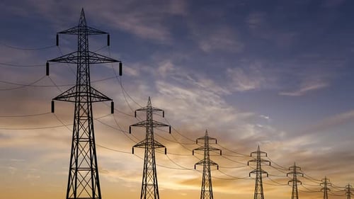 Electrical Towers Silhouette at Colorful Sunrise or Sunset