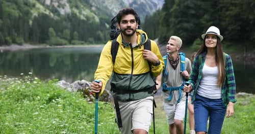 Friends Hiking Together on Mountain Trail