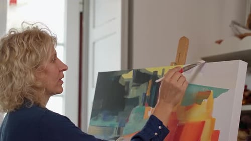 Woman Artist of Drawings Preparing to Create a Abstract Painting Image