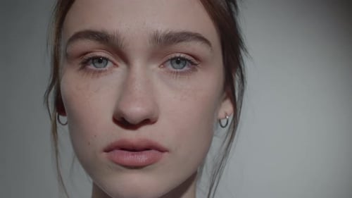 Studio Portrait of Beautiful Woman with No Makeup