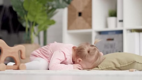 Eco Wood Toy Baby Game Little Clever Caucasian Child Playing Natural Toys on Floor at Home