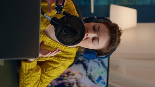 Woman Speaking Into Microphone While Vlogging