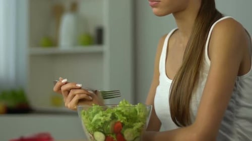 Fit Girl Eating Salad Instead of Pie, Low-Carb Diet, Vitamins, Healthy Lifestyle