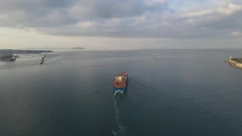 Cargo Ship Sailing on Open Water Aerial View