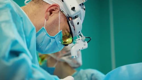 Surgeons Performing an Operation in Operating Room