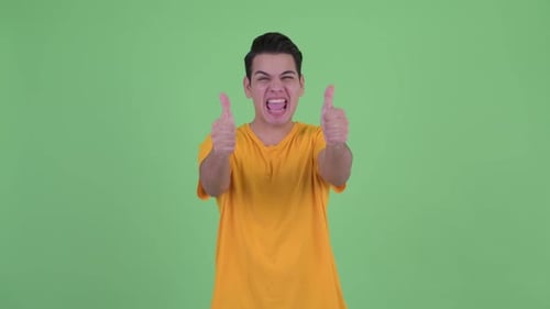 Excited Young Adult Giving Two Thumbs Up