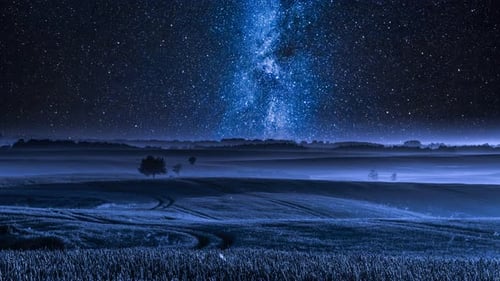 Stunning milky way over field in summer, timelapse, 4K