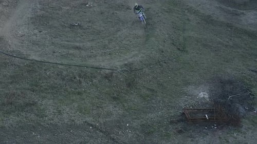 Dirt Bike Rider on Rural Motocross Track