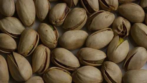 Pile of Delicious Pistachios in Shell Close Up