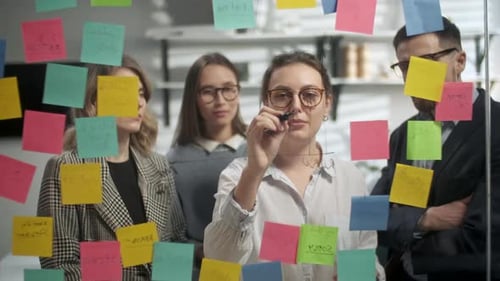 Office Workers Brainstorming and Collaborating Together