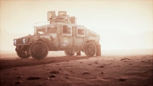 Military Patrol Car on Sunset in Desert Storm