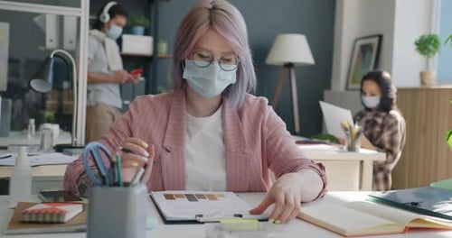 Young Woman Presents Business Data in Modern Office