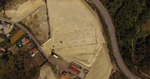 Aerial View of Construction Site Along Highway