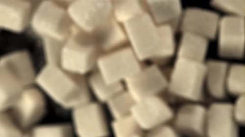 Super Slow Motion Sugar Cubes Rise Up