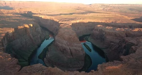 Sunlight slowly illuminating the Horseshoe bend,Colorado river,Arizona.